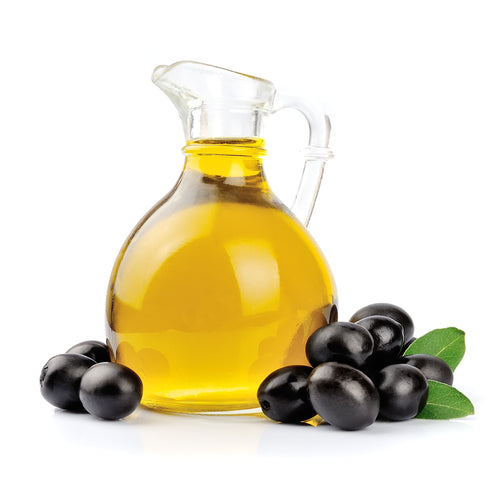 Branch with olives and a bottle of olive oil